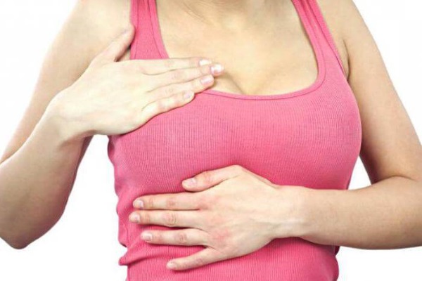 Болит грудь у женщины